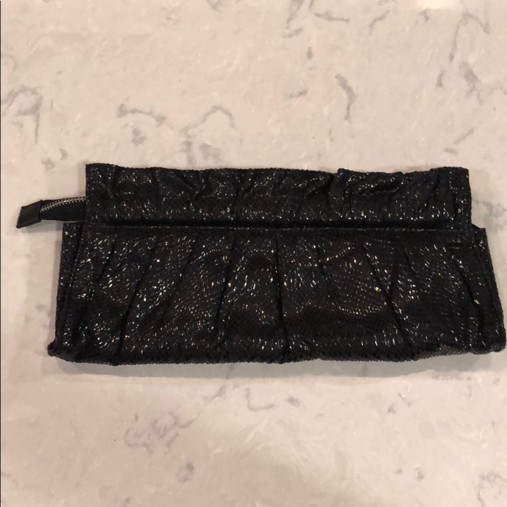 Black snakeskin design clutch
